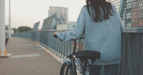 Young woman walking on city streets