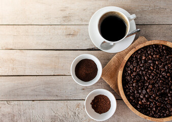 black coffee in a coffee cup  isolated on wood background. with clipping path.