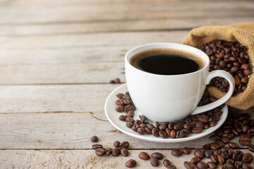 black coffee in a coffee cup  isolated on wood background. with clipping path.