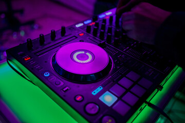 Fototapeta na wymiar DJ remote at a concert party