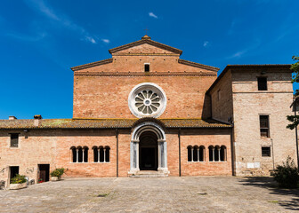 Abbey of Chiaravalle di Fiastra , Cistercian abbey, main entrance, arcades in Lombard Romanesque...