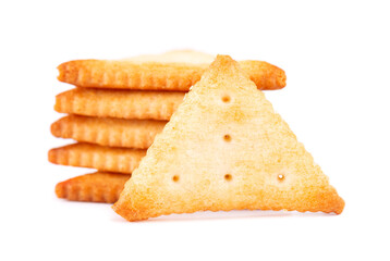 Cracker isolated on white background. Dry cracker cookies isolated. Salty snacks isolated. Top view.