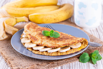 Oatmeal pancake with banana for breakfast