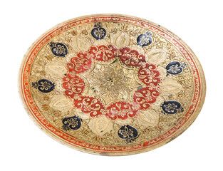 vintage indian handcrafted embossed brass plate isolated on white background handmade made in the middle of the 20th century
