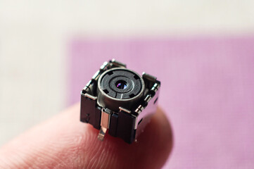 Micro camera for tracking and counting the population after the coronavirus pandemic on the finger.
