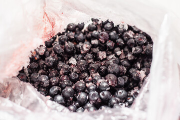 A bag of frozen blueberries, focus on the background