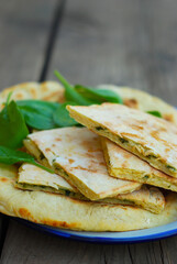 Homemade tortillas with onions and spinach