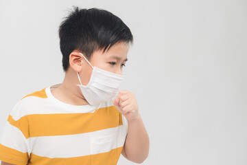 Asian boy wearing a face mask with coughing