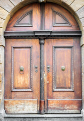 Wooden old door. Entrance to old building.
