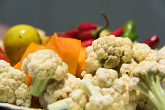 A close up of arrangement and assortment of freshly cut fruits and vegetables.........