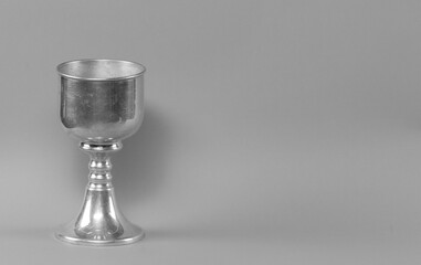 silver sports cup isolated on black background