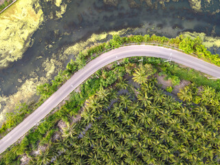 Aerial drone view of asphalt road with rural farmland landscape. Beautiful aerial landscape.