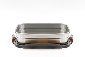 Front view stainless steel food container or lunch box on white background. Opened stainless steel food container box, empty box. 