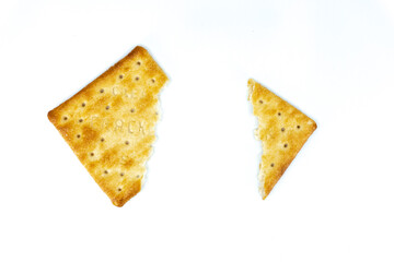 Cream cracker biscuit isolated on white background with copy space.