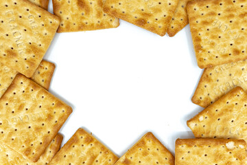 Cream cracker biscuit isolated on white background with copy space.