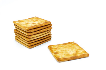 Cream cracker biscuit isolated on white background with copy space.