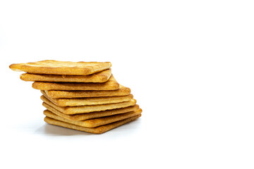 Cream cracker biscuit isolated on white background with copy space.