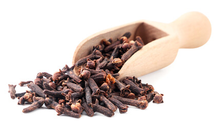 Clove in a wooden scoop close-up on a white background. Isolated