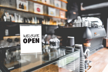 Come in we're open  in cafe owner open startup with cafe shop