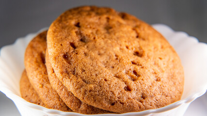 Close up of Butter Crunch Cookies served in a small porcelain bowl