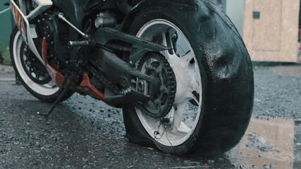 Motorcycle after burnout with explosion wheel. Big damage