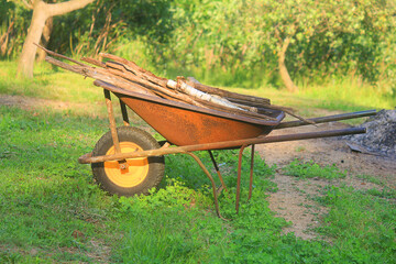 wheelbarrow with wood