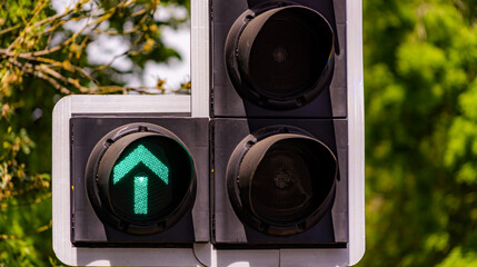 Traffic light with green straight on arrow / symbol