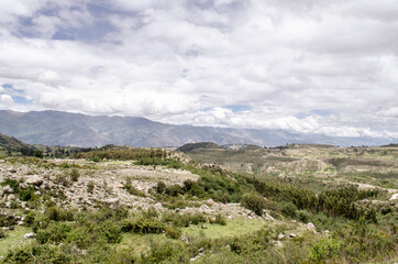 Fototapeta na wymiar Green meadows in a mountainous hiking area