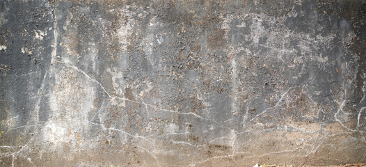 old cracked wall background texture with paint peeling off and copy space