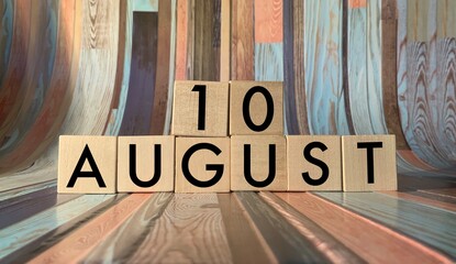 August 10. August 10 on wooden cubes on a wooden background. An image for a holiday .Summer day....