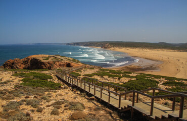 Sandy beach for surfers at atlantic coastline of Portugal