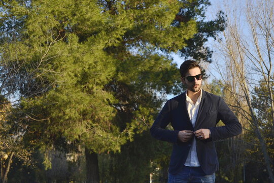 actractive Business man with green natural background