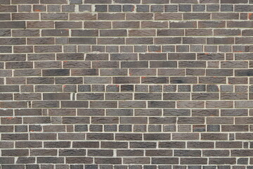 Brown background of beautiful unusual building brick