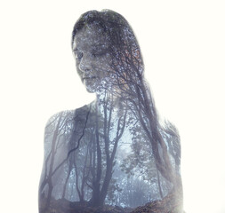 Dreams. Double exposure with woman and misty forest in fog