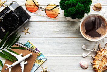 Traveler accessories on wooden  background