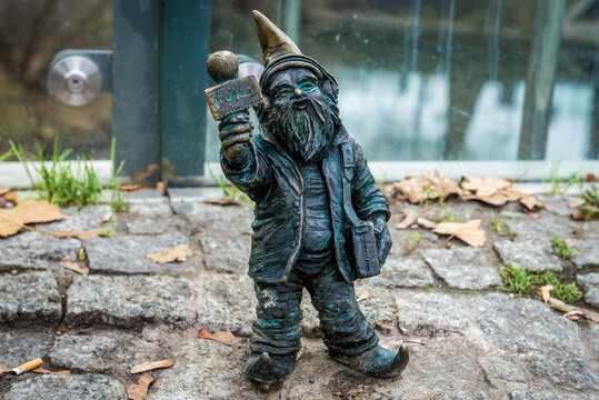 Wroclaw, Poland - December 1, 2019: Radio Journalist Dwarf Statuette In Historic Part Of Wroclaw City