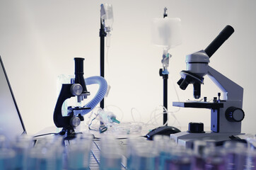 lab supplies glass test tubes, blood test tubes and microscope