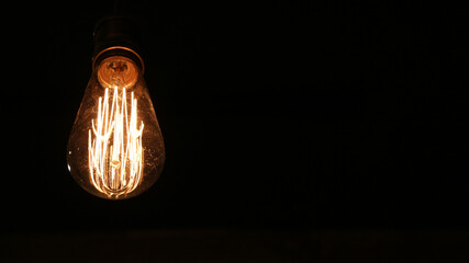 Light bulb close-up on a black background