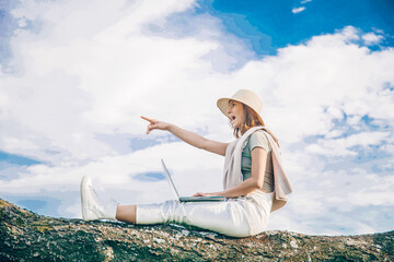 girl with laptop. Work. Working. Sky background. 