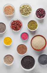 Healthy food clean eating selection: berry, seeds, nuts, superfood, cereals. Health and super food to boost immune system high in antioxidants, anthocyanins, minerals and vitamins.