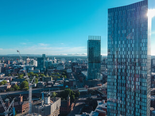 Naklejka premium Manchester City Centre Drone Aerial View Above Building Work Sky