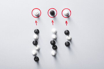 Chess pieces on a white background with red special round places