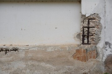 The reinforced concrete beam is damaged and cannot be used safely.