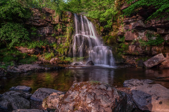 East Gill Force, Keld, Swaledale, in the dramtic countryside of North Yorkshire, fantastic adventure travel destination or holiday vacation to view picturesque scenery at sunrise or sunset © Andy