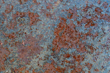 rust on metal, painted metal that has been corroded