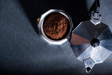 Geyser coffee maker top view. Ground coffee.