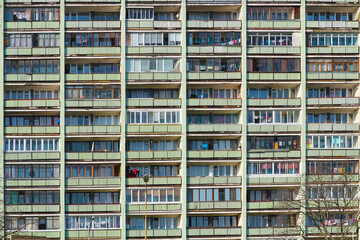 Balconies of a multi-storey apartment building. Old Soviet high-rise building with balconies. City background.