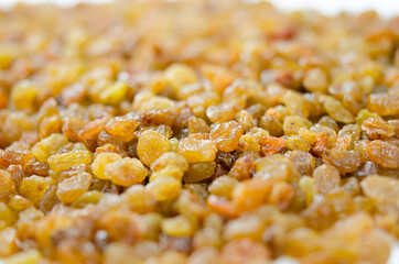 Raisins close up. Dry grapes. Dried fruits for healthy food, dessert substitute