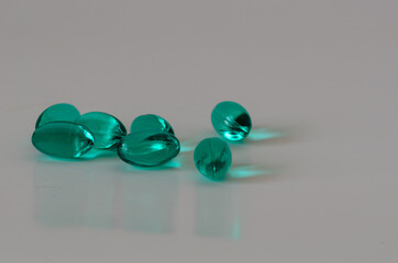 Close up capsules on the white background.