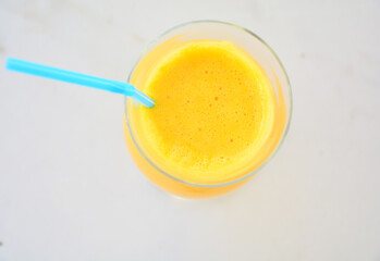 Fresh orange juice on the white 